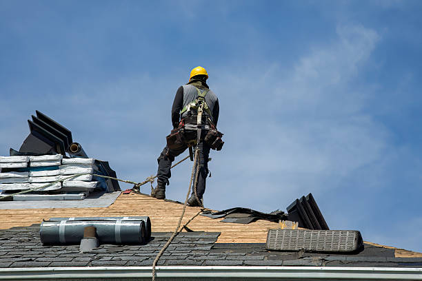 Professional Storm Damage Roof Repair technician working in Wilton, ME